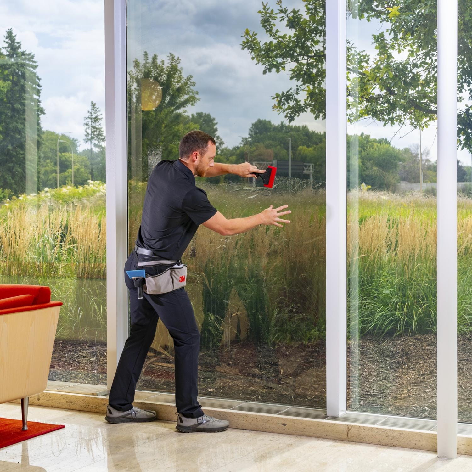 3M window film being installed in a home